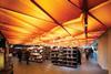 The back-lit acrylic ceiling unites the food hall space.