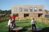 A children’s play area is one of a range of landscapes interposed between the houses.