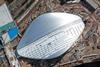 The partly complete wave-like roof of Zaha Hadid’s Olympic Aquatics Centre.