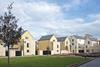 The buildings make use of a traditional palette of Portland stone and cream render.