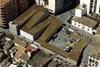 The zigzag roof covers a car park, supermarket, council offices and public market.