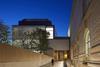 The bridge between the main extension and the existing gallery spans a new pedestrian route