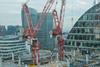 Tower cranes at the Sir Robert Mcalpine Construction site above Moorfields tube station