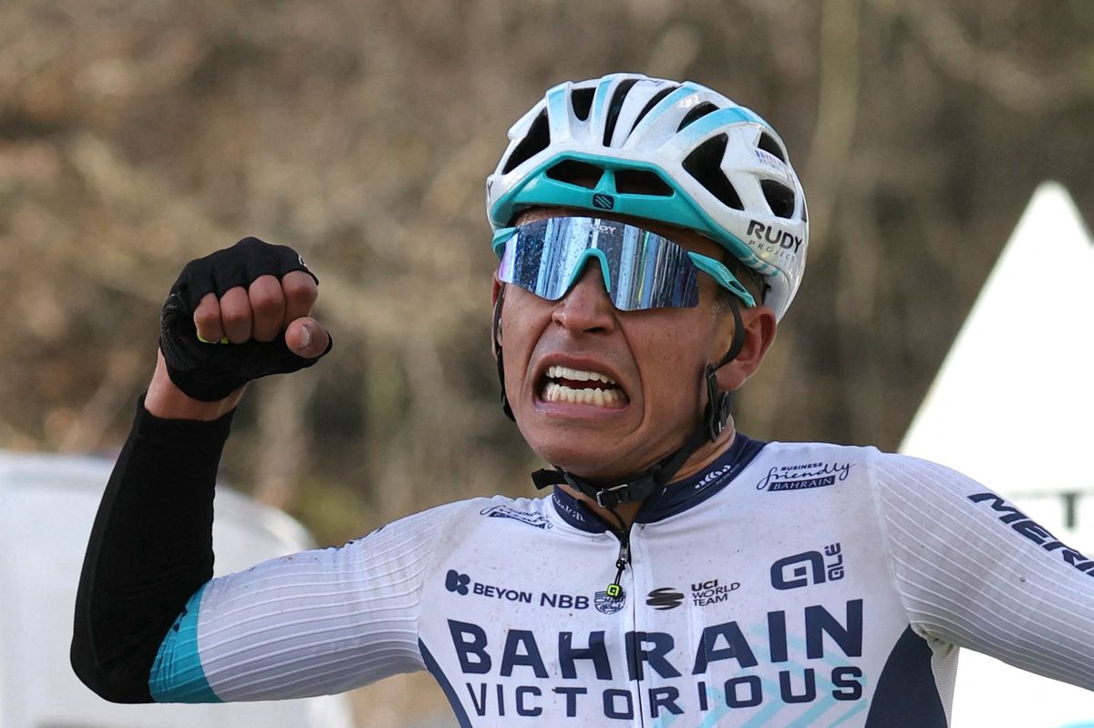 TOPSHOT - Bahrain Victorious's Colombian cyclist Santiago Buitrago celebrates as he crosses the finish line to win the 4th stage of the Paris-Nice cycling race, 183 km between Chalon-sur-Saone and Mont Brouilly, on March 6, 2024. (Photo by Thomas SAMSON / AFP)