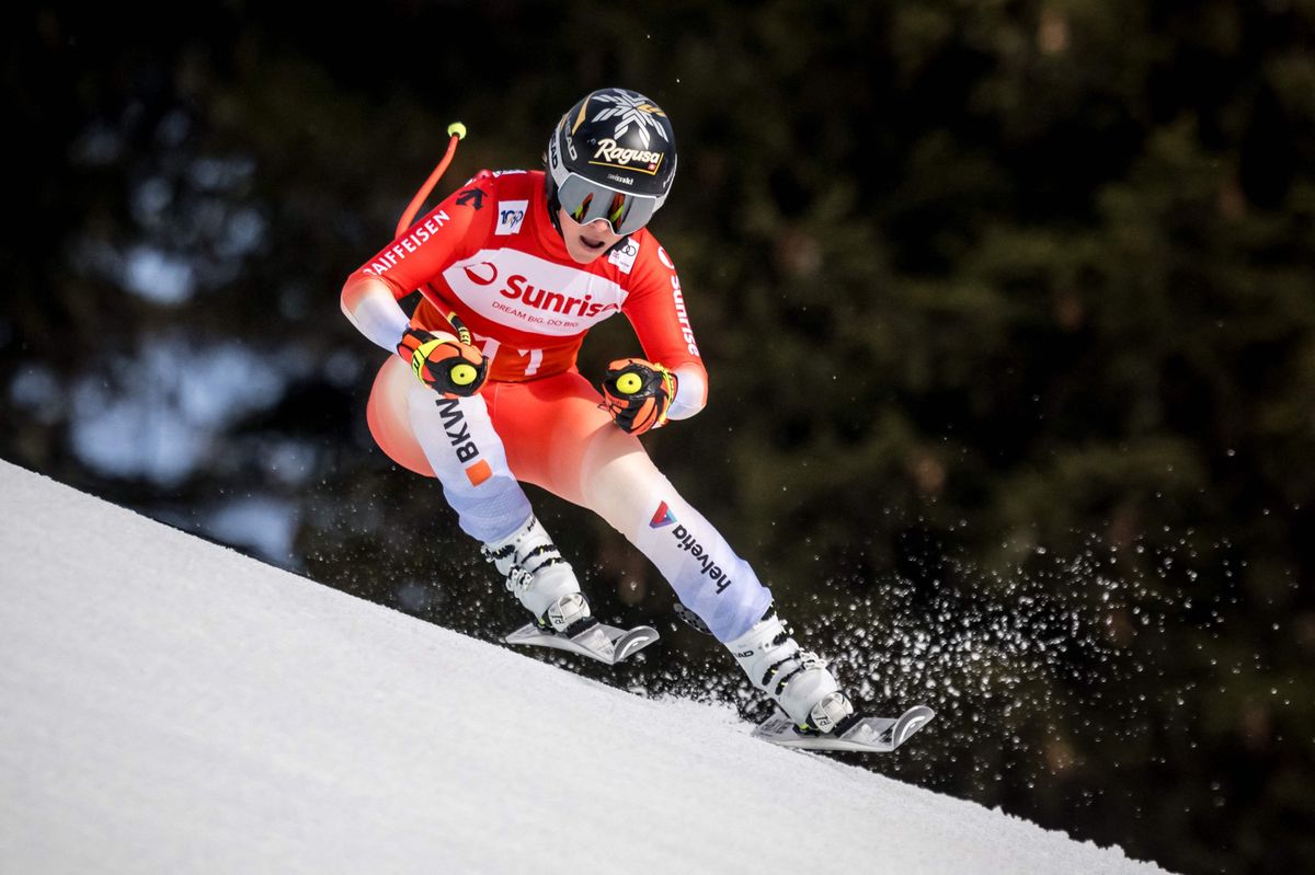 TOPSHOT - Switzerland's Lara Gut-Behrami competes during the Women's downhill event at the FIS Alpine Ski World Cup in Crans-Montana, Switzerland, on February 16, 2024. (Photo by Fabrice COFFRINI / AFP)
