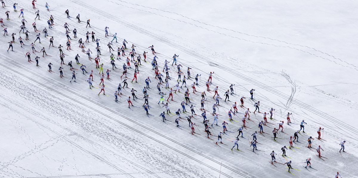 The pack of skiers is on its way from Maloja to S-Chanf as they participate in the 53. annual Engadin skiing marathon, on Sunday, March 12, 2023, in Maloja im Engadin, Switzerland. (KEYSTONE/Peter Klaunzer)