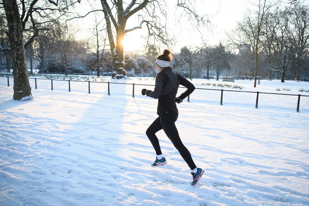 LONDON, UNITED KINGDOM - FEBRUARY 28:  A jogger runs through the snow in St James' Park on February 28, 2018 in London, United Kingdom. Freezing weather conditions dubbed the "Beast from the East" brings snow and sub-zero temperatures to the UK.  (Photo by Leon Neal/Getty Images)