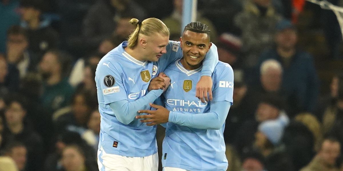 Manchester City's Manuel Akanji, right, celebrates with his teammate Erling Haaland after he scored his side's first goalduring a Champions League round of sixteen second leg soccer match between Manchester City and Copenhagen, at the Etihad Stadium in Manchester, England, Wednesday, March 6, 2024. (AP Photo/Dave Thompson)