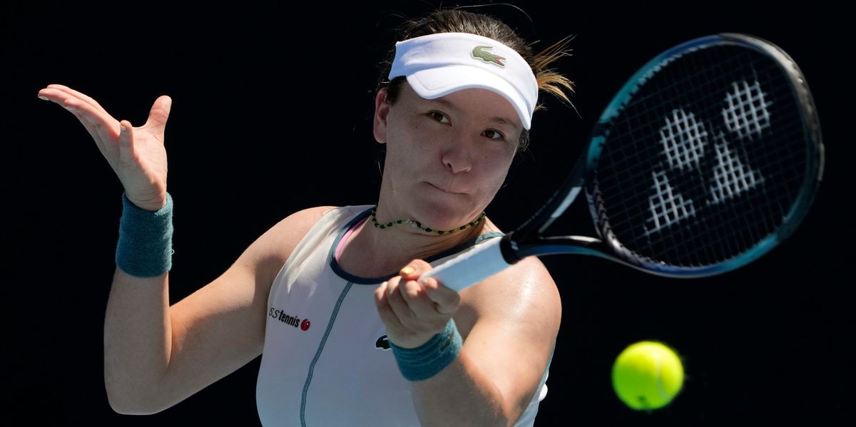 Lulu Sun of Switzerland plays a forehand return to Elisabetta Cocciaretto of Italy during their first round match at the Australian Open tennis championships at Melbourne Park, Melbourne, Australia, Tuesday, Jan. 16, 2024. (AP Photo/Andy Wong)