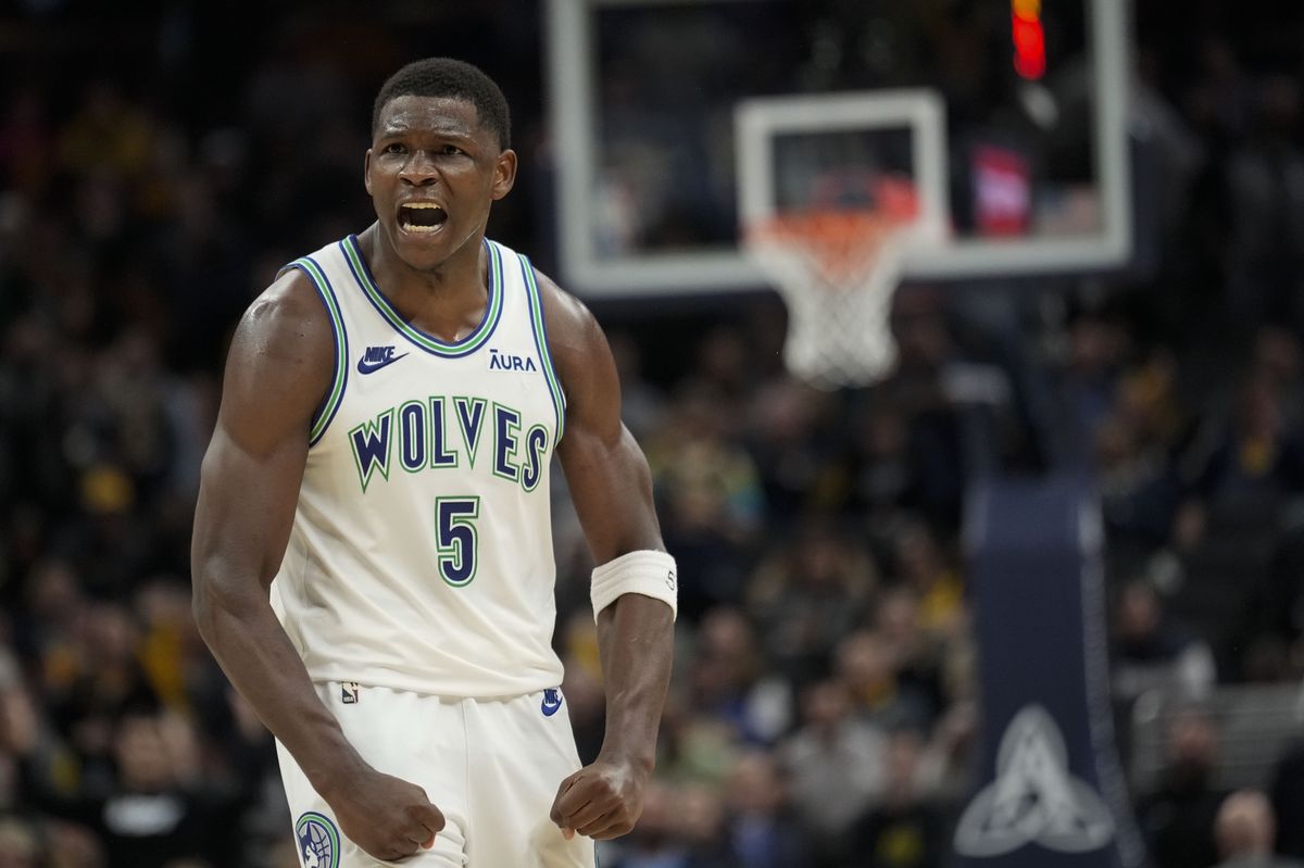 Minnesota Timberwolves guard Anthony Edwards (5) reacts after scoring against the Indiana Pacers during the second half of an NBA basketball game Thursday, March 7, 2024, in Indianapolis. The Timberwolves won 113-111. (AP Photo/AJ Mast)